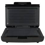 Sanduchera Grill Home Elements HESMG155N abierta con placas antiadherentes con diseño de parrilla
